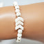 Down Syndrome Awareness Unisex bracelet with natural sandalwood and cream Howlite beads - Down Syndrome Boutique