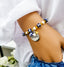 Down Syndrome Awareness Jewelry, Blue lamp glass and yellow beaded stretch bracelet, The Lucky Few, TRIBE charm