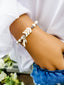 Creamy Howlite and silver beaded stretch bracelet with pearlized chevrons for Everyday Down Syndrome Awareness