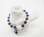 Blue lapis lazuli beaded stretch bracelet with white glass chevrons and silver accents, Down Syndrome Jewelry and Gifts, The Lucky Few - Down Syndrome Boutique