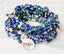 Blue beaded 5 and 12 wrap stretch bracelet with a Down Syndrome Awareness charm