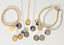 Simple in design, but big on Everyday Awareness. The Lucky Few hand embossed earrings in silver or gold