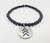 The Lucky Few black onyx charm bracelet that celebrates and promotes inclusivity in style - Down Syndrome Boutique