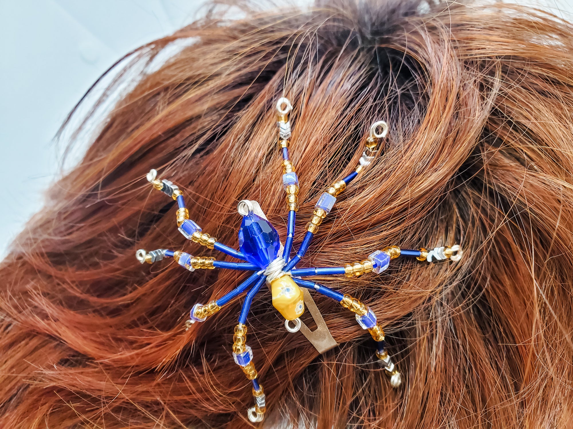 The Lucky Few Spider spins webs of love, kindness and protection and is the perfect gift for those in the Down Syndrome community.