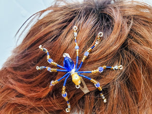 The Lucky Few Spider spins webs of love, kindness and protection and is the perfect gift for those in the Down Syndrome community.