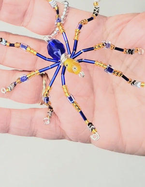 The Lucky Few Spider spins webs of love, kindness and protection and is the perfect gift for those in the Down Syndrome community.