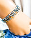 Three tiny chevrons are surrounded by sparkling blue and yellow faceted beads. Perfect for Everyday Awareness! - Down Syndrome Boutique