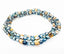 Three tiny chevrons are surrounded by sparkling blue and yellow faceted beads. Perfect for Everyday Awareness! - Down Syndrome Boutique