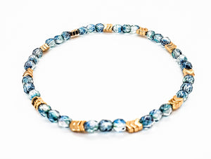 Three tiny chevrons are surrounded by sparkling blue and yellow faceted beads. Perfect for Everyday Awareness! - Down Syndrome Boutique