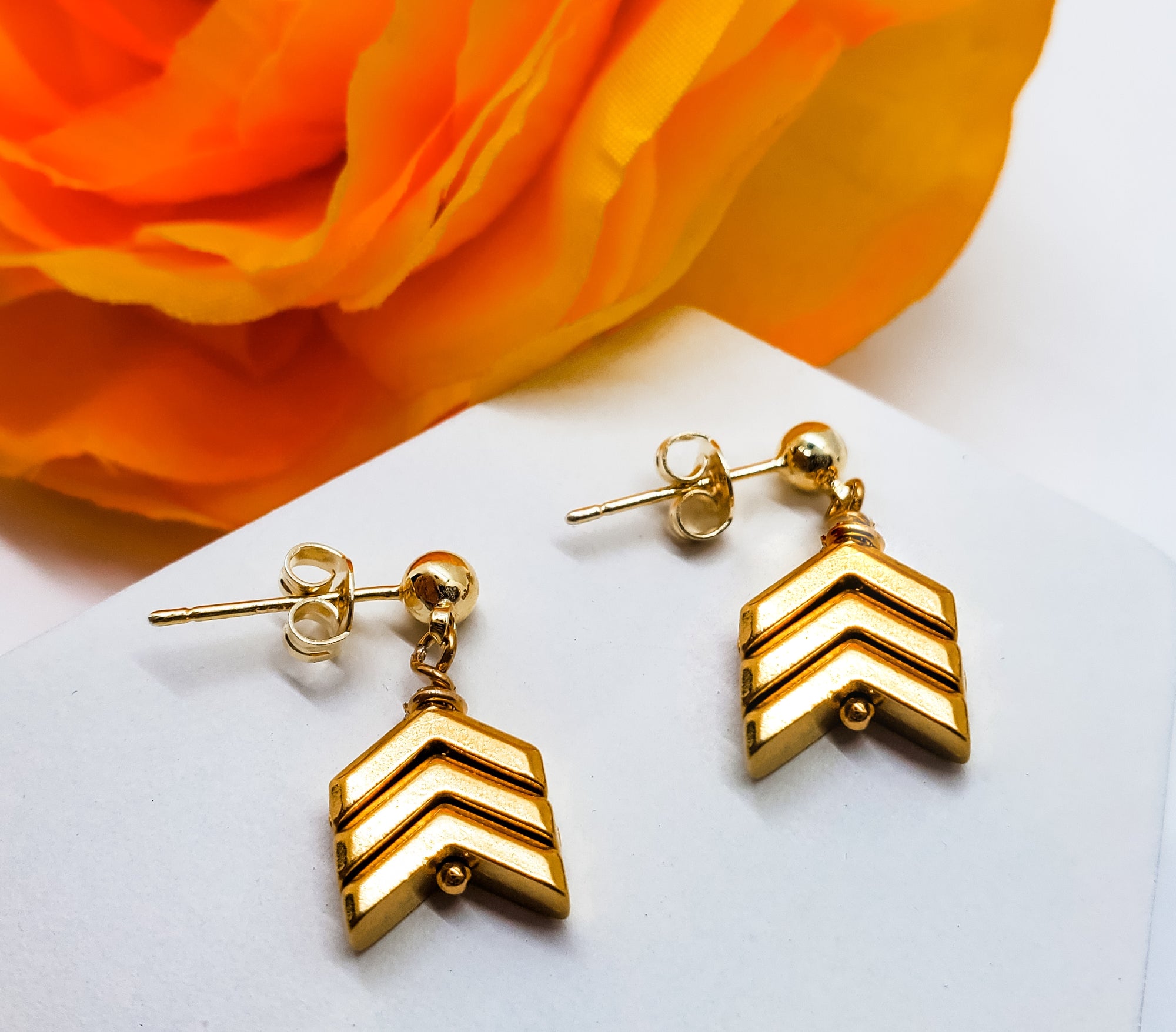 Simple in design, but big on Everyday Awareness. Gold, Silver, or Bronze chevron earrings - Down Syndrome Boutique