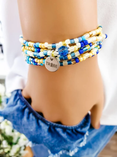 Fun and versatile seed bead wrap bracelet that features the chevron TRIBE charm - Down Syndrome Boutique