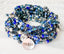 Blue beaded 5 and 12 wrap stretch bracelet with a Down Syndrome Awareness charm